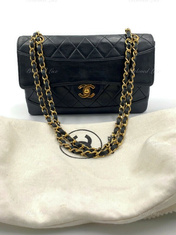 CHANEL Chain Shoulder Bag Clutch Black Quilted Flap Lambskin Purse Leather  ref.226136 - Joli Closet