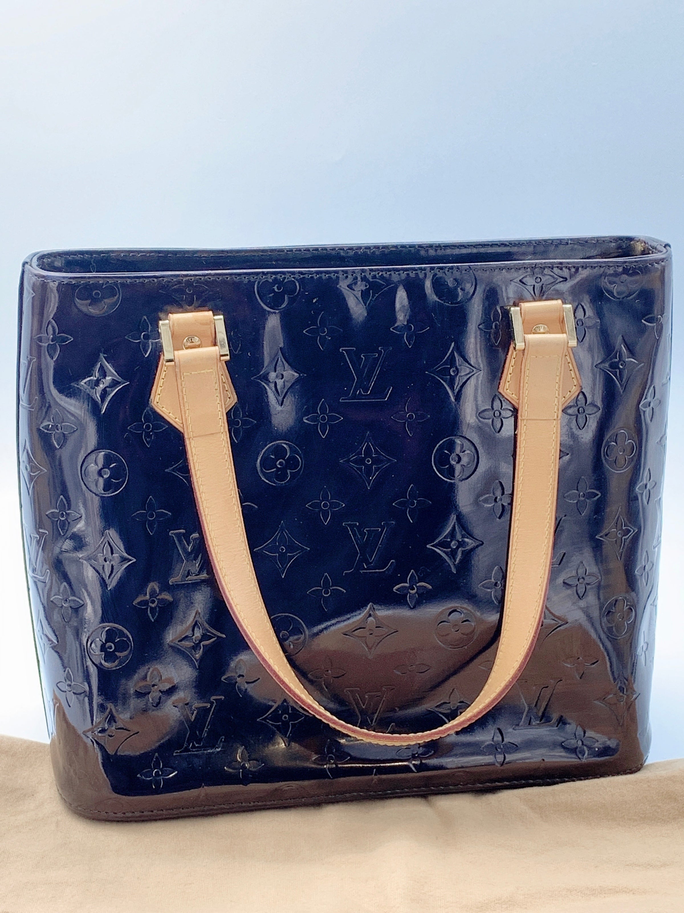 Sold at Auction: LOUIS VUITTON VERNIS HOUSTON LEATHER BAG; feature LV  monogram embossed vernis patent leather body, flat leather vachetta cowhide  s