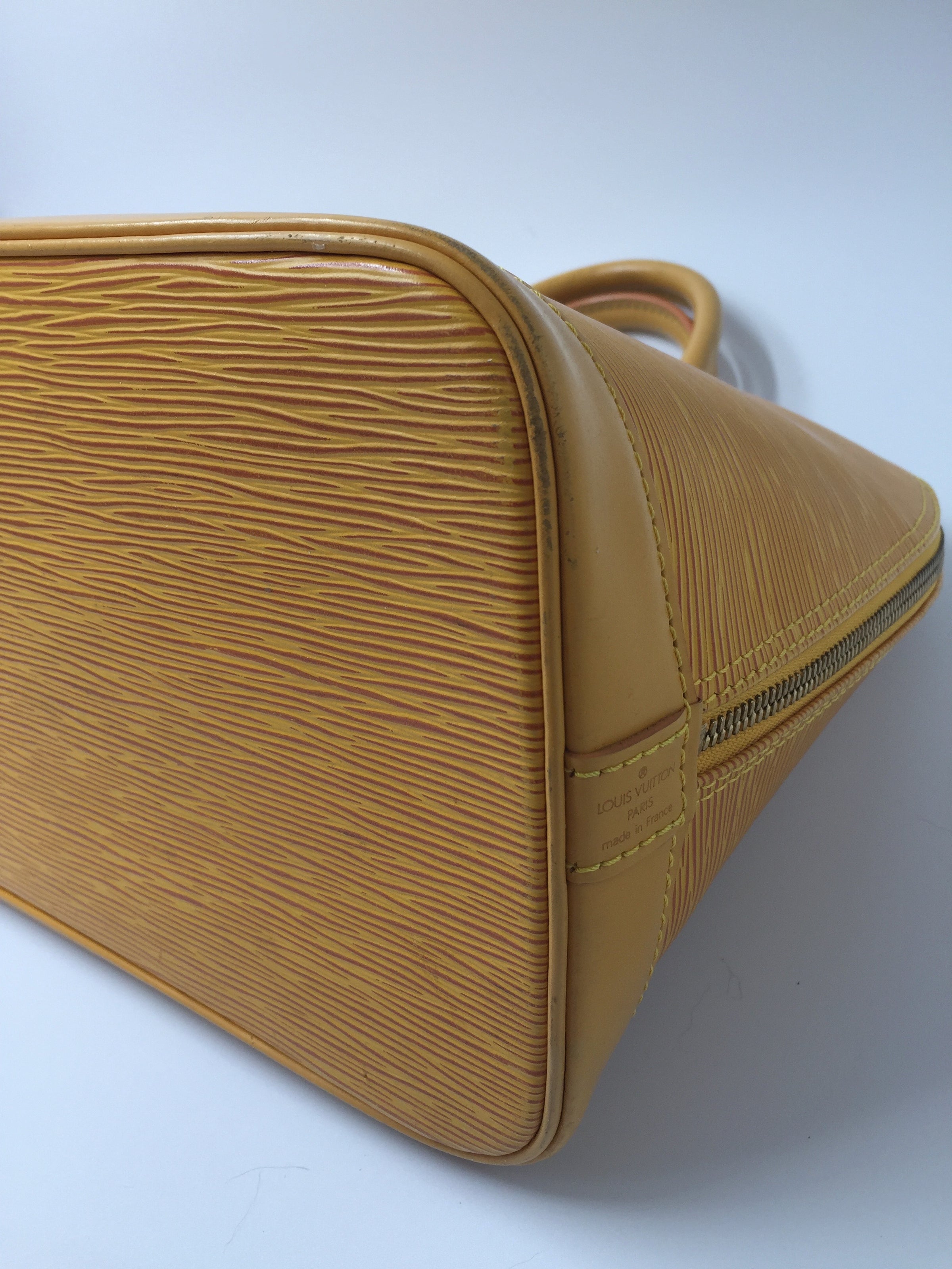 Louis Vuitton Alma Handbag Yellow Epi Leather M52149 – Timeless