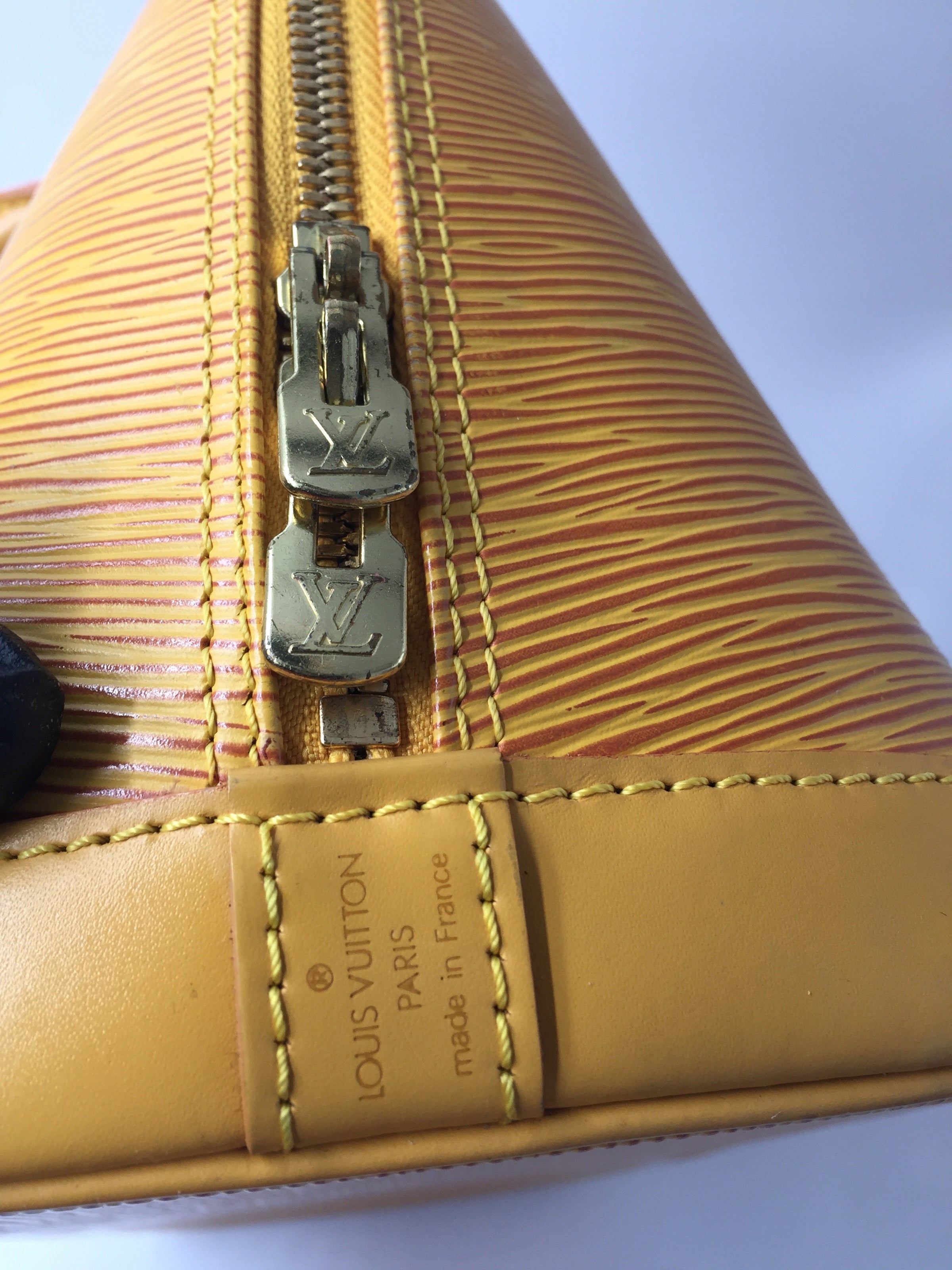 Louis Vuitton Alma Handbag Yellow Epi Leather M52149 – Timeless Vintage  Company
